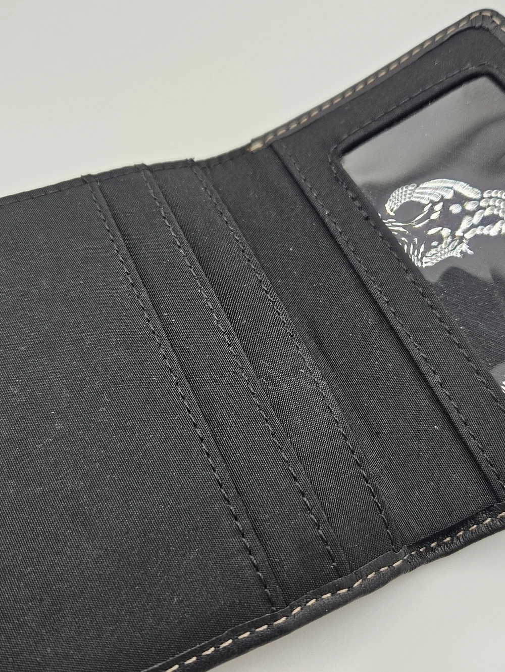 Black genuine leather trifold wallet